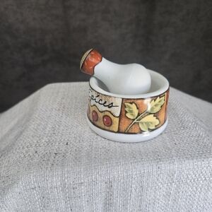 White Ceramic Mortar and Pestle with Orange Leaf Accent